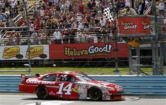 Tony Stewart wins at Watkins Glen Tony Stewart runs a Heluva Good race to win at Watkins Glen.